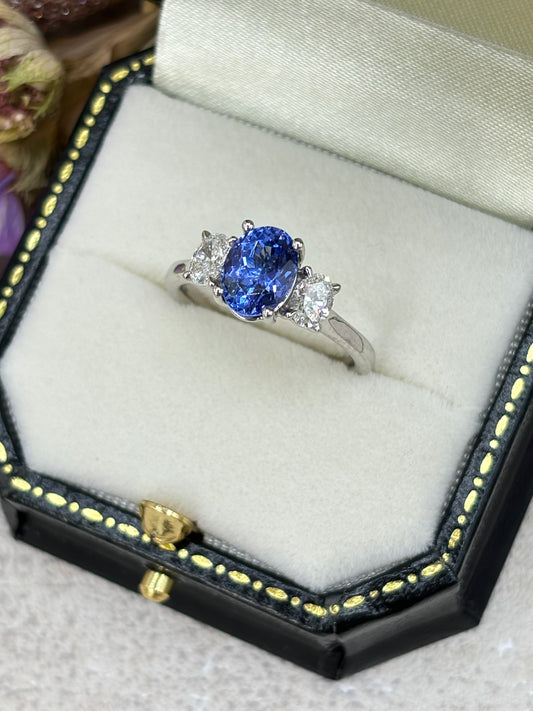 Platinum Oval Tanzanite and Diamond Three Stone Ring.