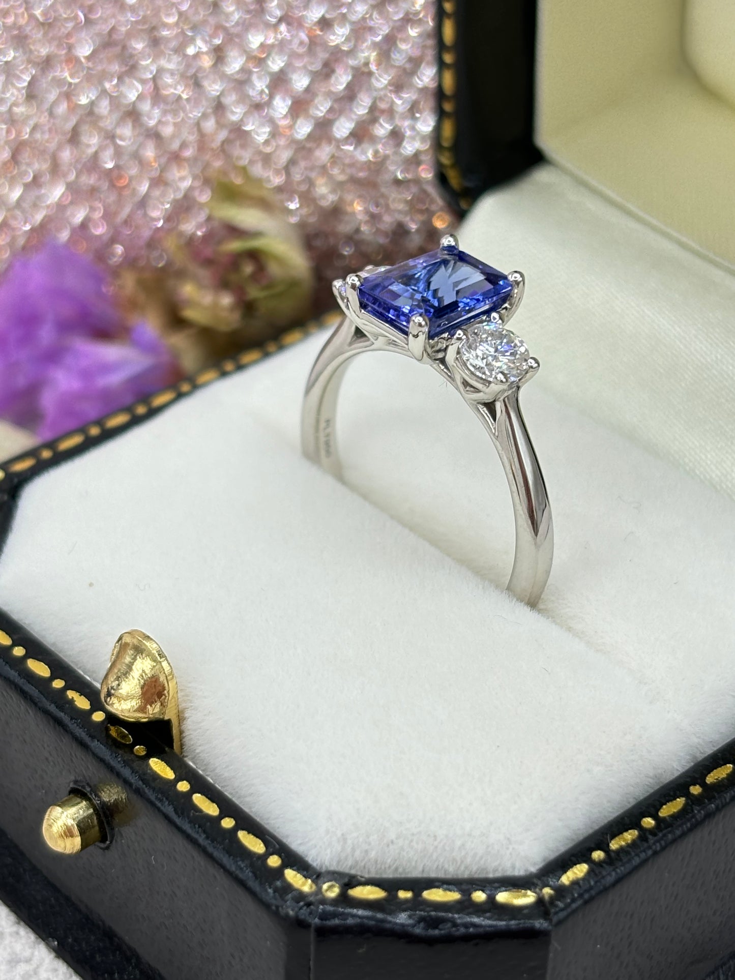 Platinum Tanzanite and Diamond Three Stone Ring.